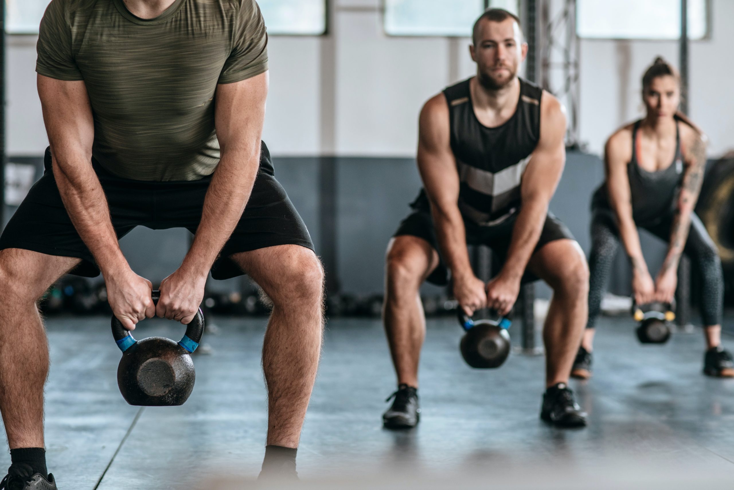 group class kettlebell swings